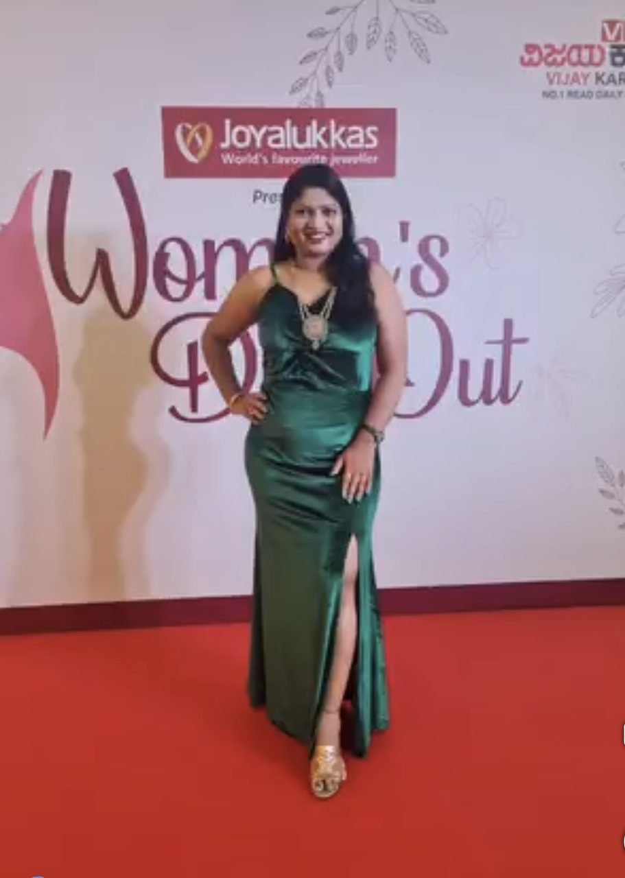 Chitra Badiger at a Joy Alukkas event backdrop