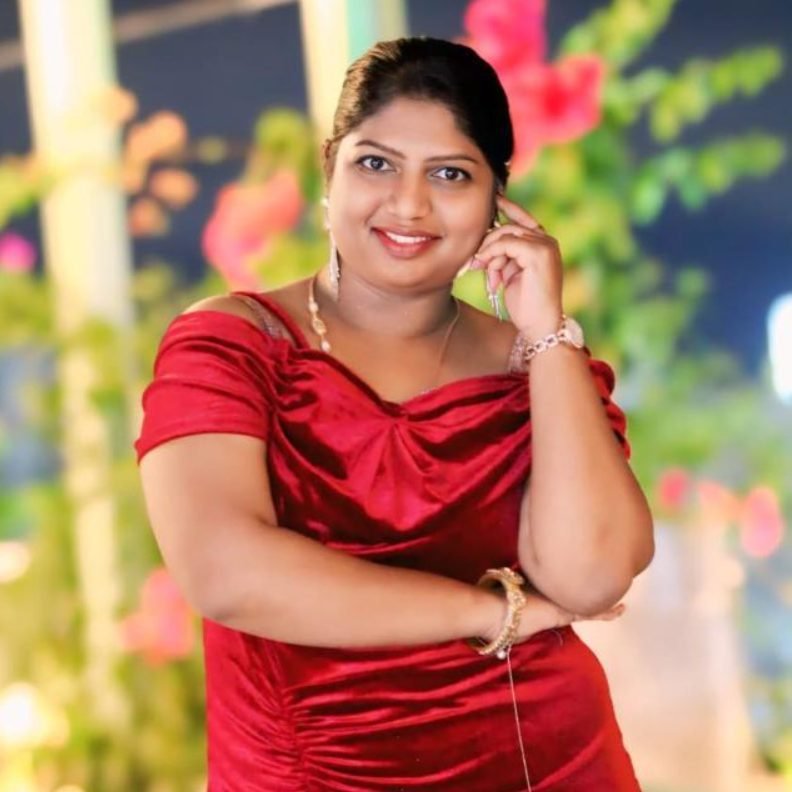 Portrait of Chitra Badiger in a red dress