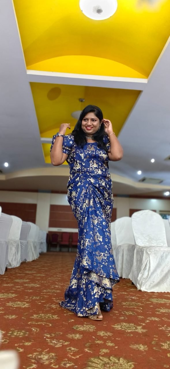 Portrait of Chitra Badiger in a blue dress